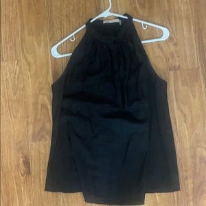 Black sleeveless blouse